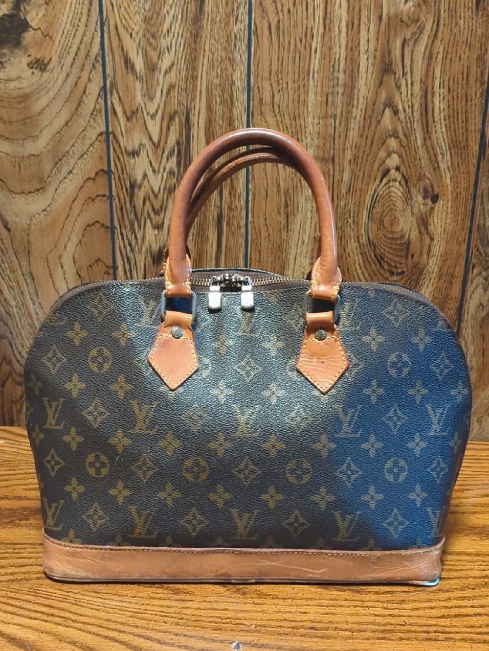 Louis Vuitton Monogram Alma Satchel - Brown and Tan